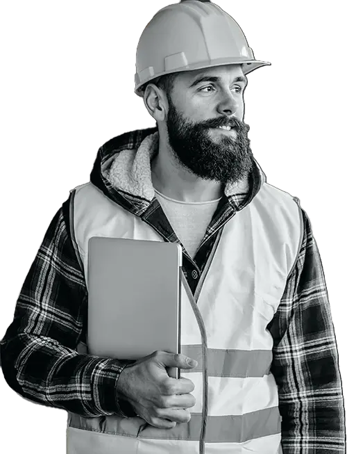 Construction business owner holding a laptop