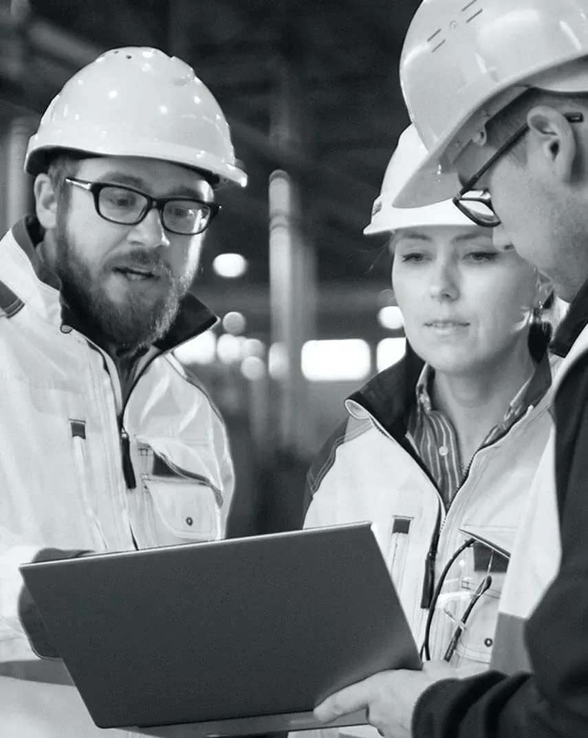 Construction workers collaborating on site