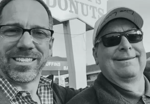 Mike Trampetti and his father outside the family donut shop